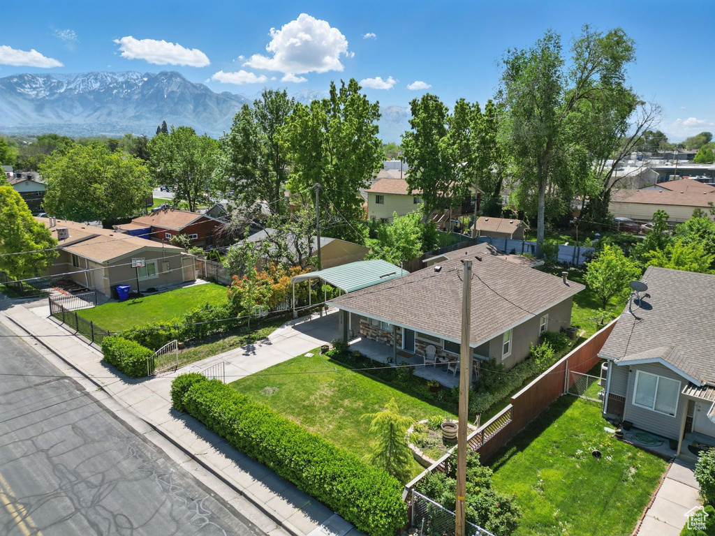 Aerial view of residential area with a mountain backdrop