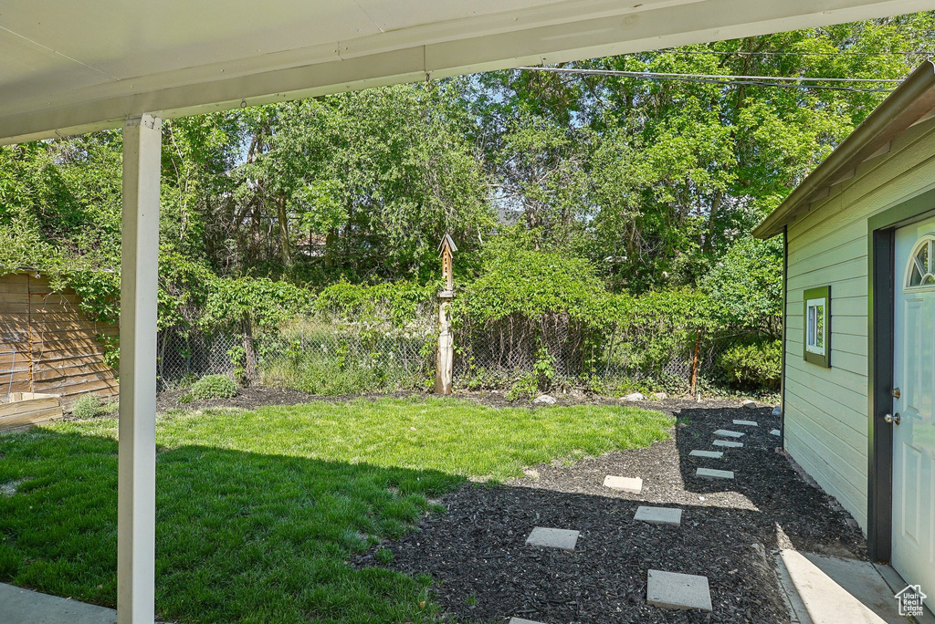 View of yard with view of scattered trees