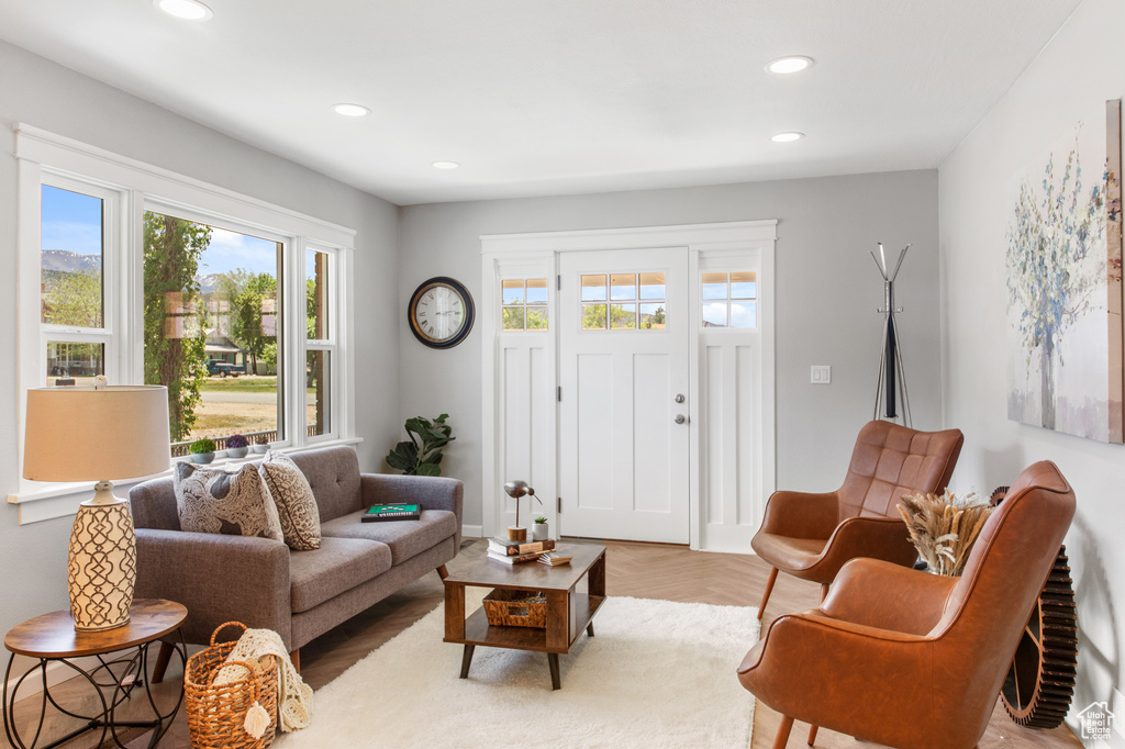 Living area featuring recessed lighting and baseboards