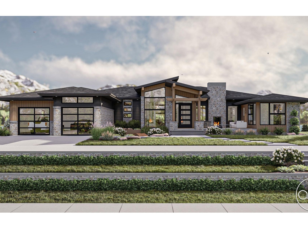 Modern home featuring stone siding, a garage, and concrete driveway
