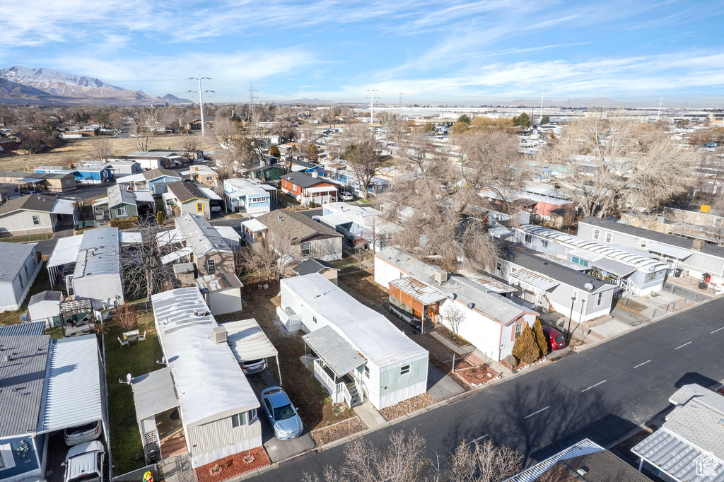 Aerial view of residential area with a mountainous background