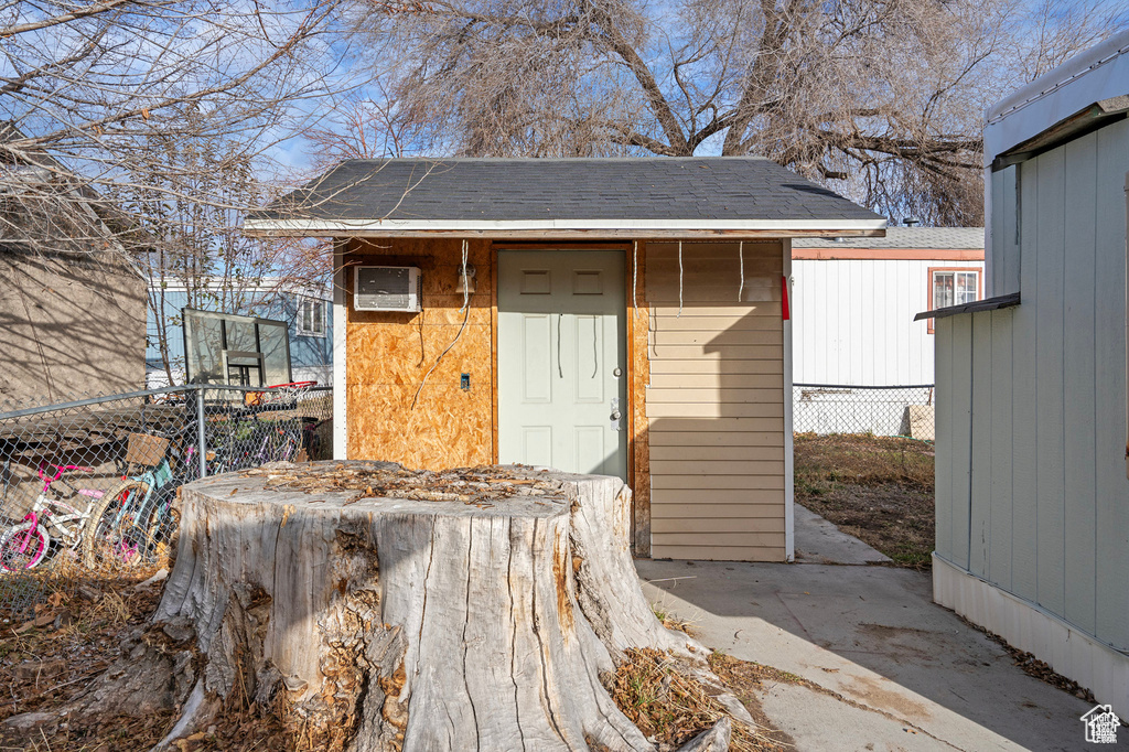View of shed with fence