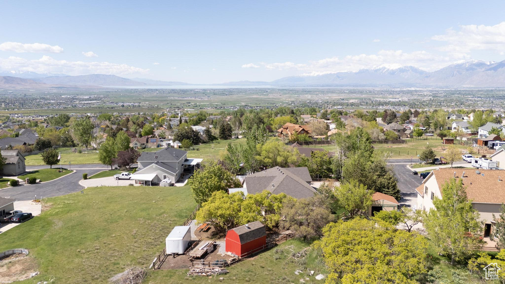 Aerial view of residential area with a mountainous background