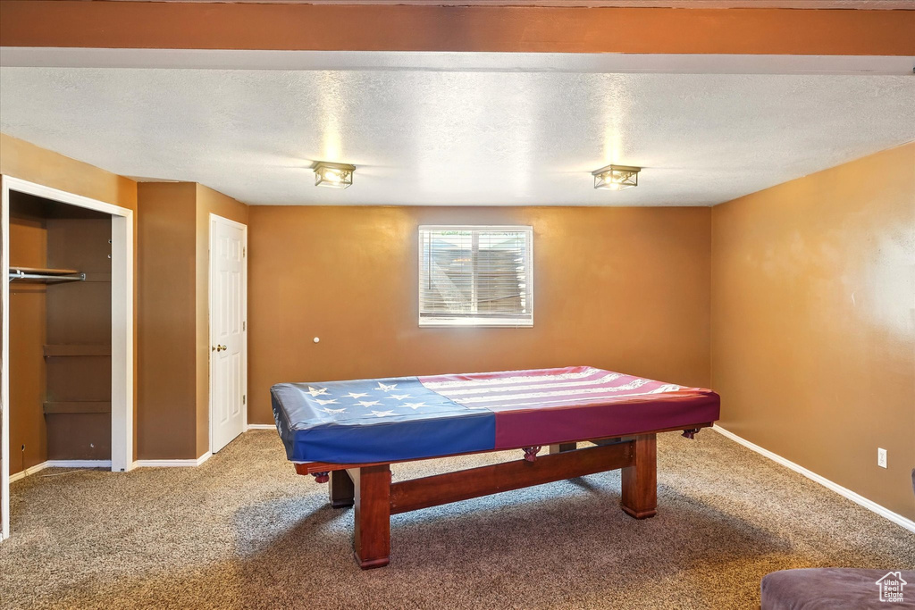 Playroom featuring billiards table, carpet flooring, and baseboards