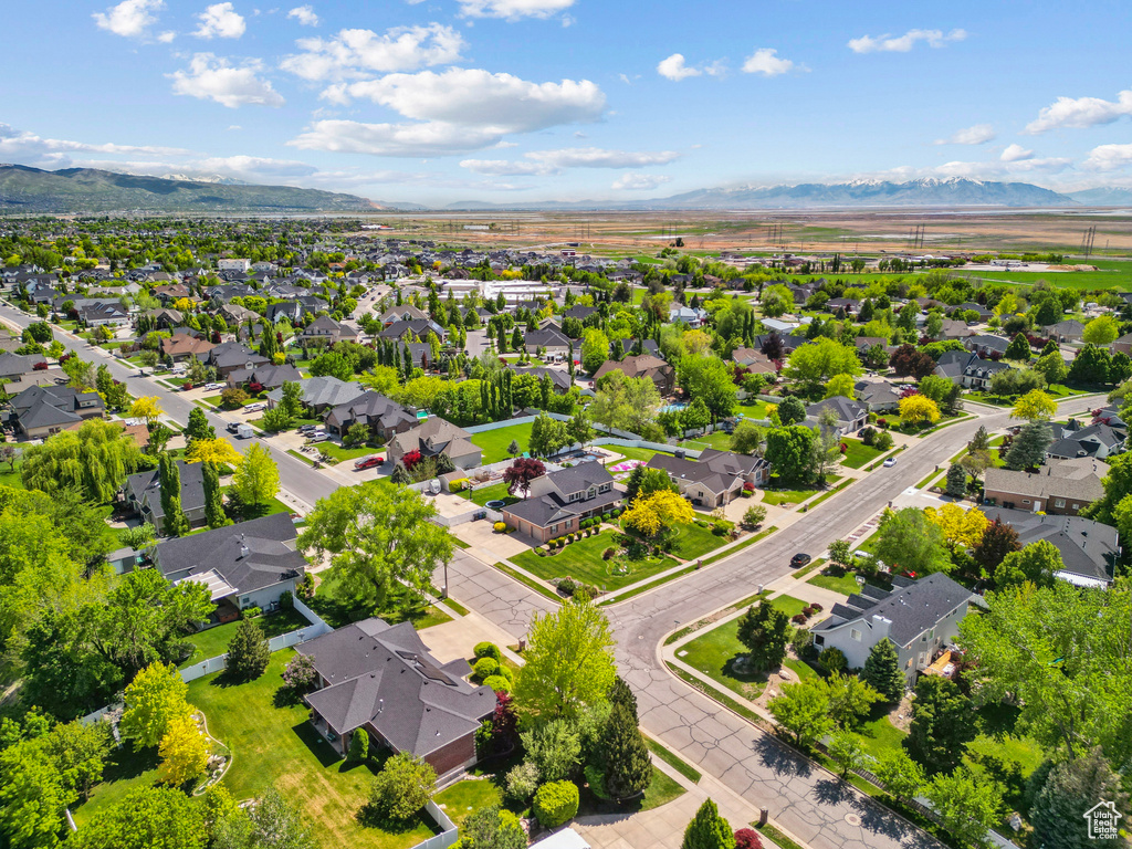 Aerial view of residential area with a mountainous background