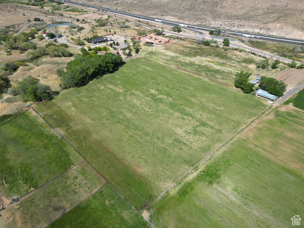 Aerial view of property and surrounding area with rural landscape