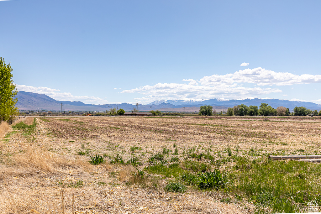 View of mountain backdrop featuring rural landscape