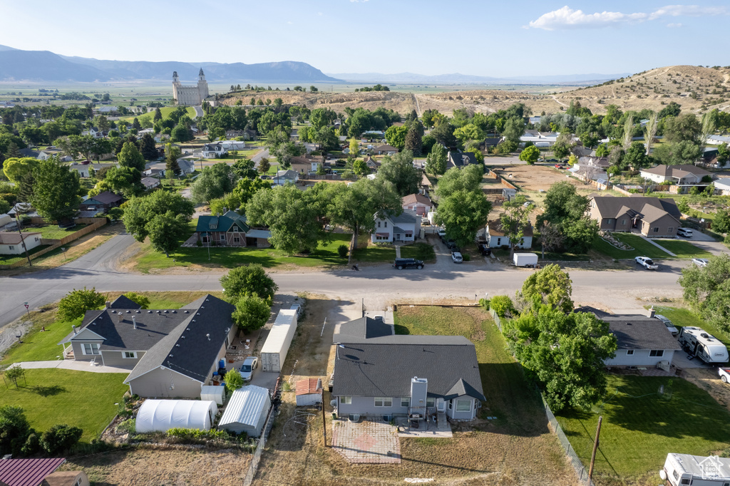 Aerial perspective of suburban area with mountains