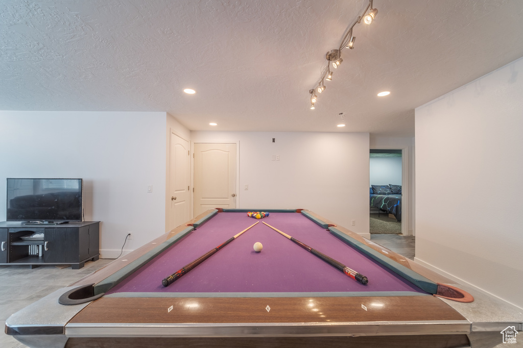 Playroom with baseboards, pool table, recessed lighting, and a textured ceiling