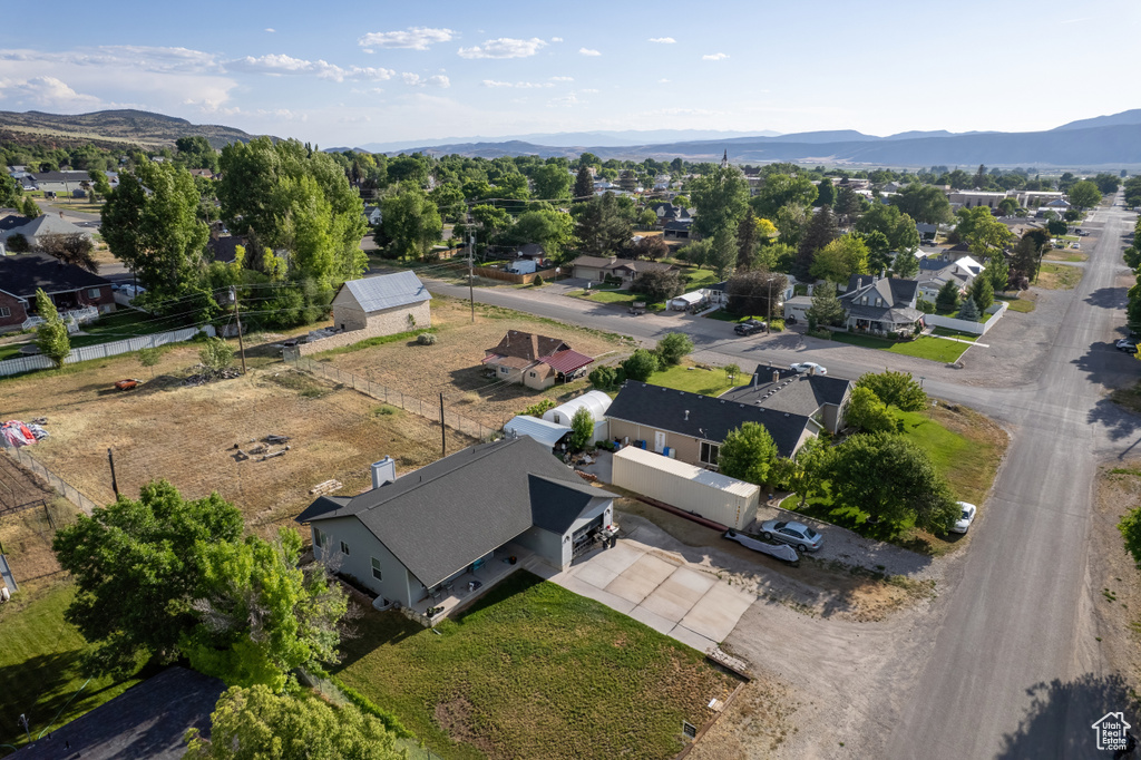 Aerial view of residential area featuring mountains