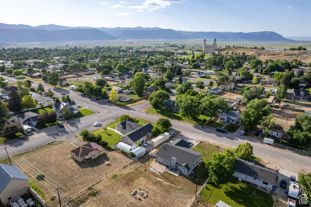 Aerial perspective of suburban area featuring mountains