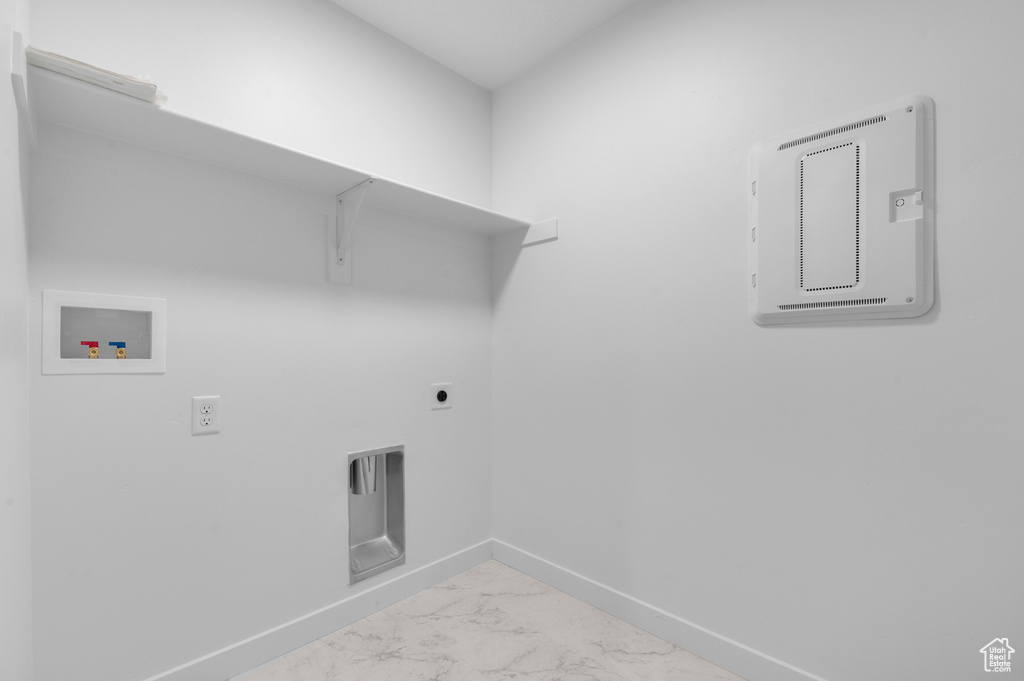 Laundry room with hookup for a washing machine, marble finish floors, baseboards, and hookup for an electric dryer