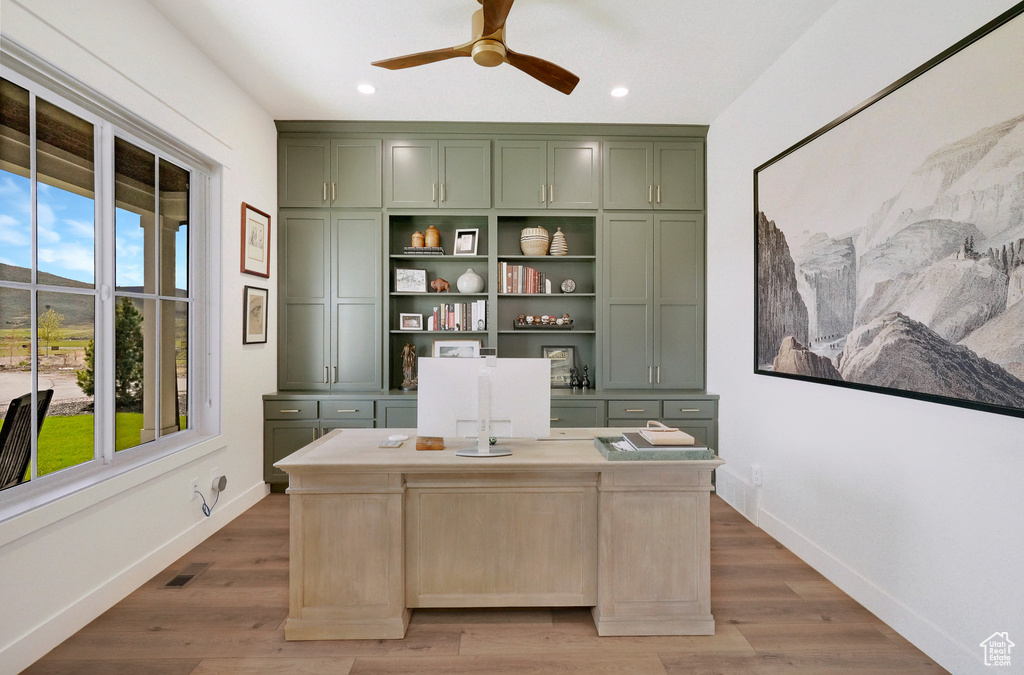 Office with a ceiling fan, wood finished floors, baseboards, and recessed lighting