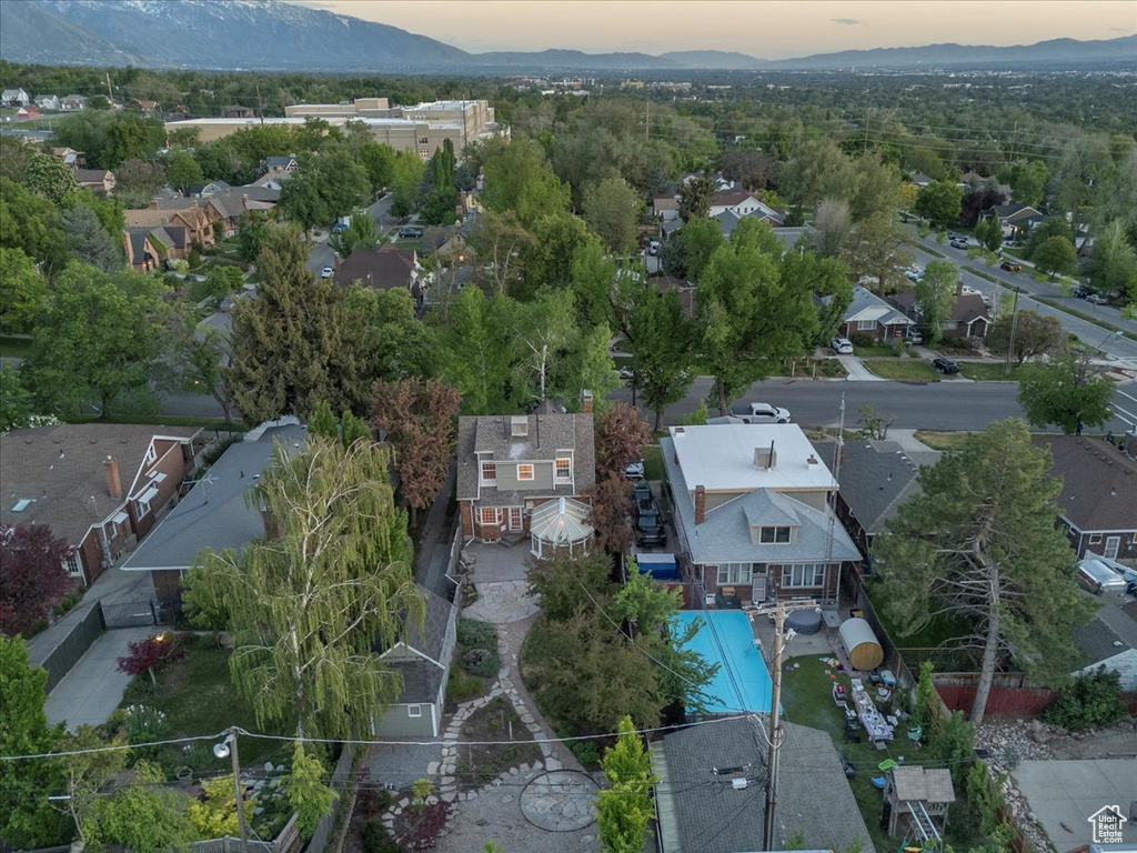 Aerial view at dusk of a mountain view and a residential view