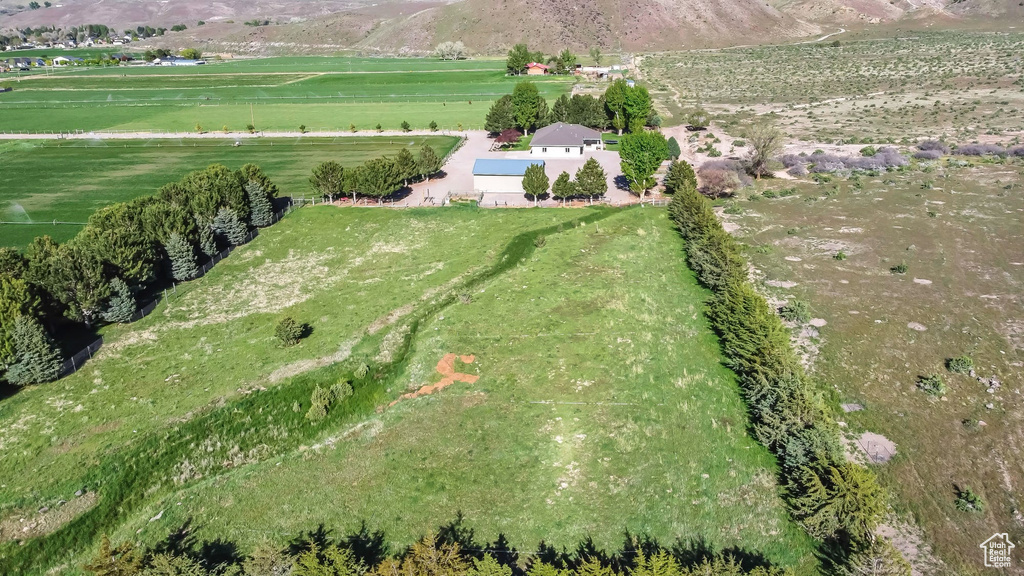 Aerial view of sparsely populated area featuring a mountainous background