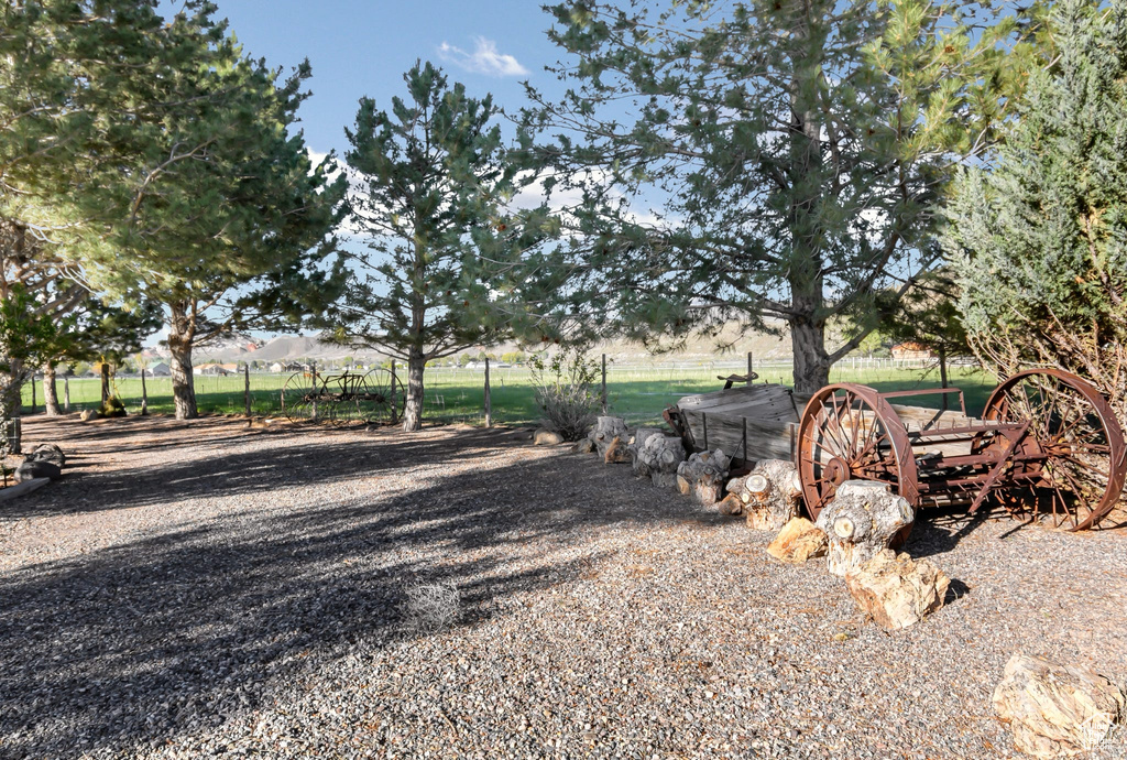 View of yard featuring fence