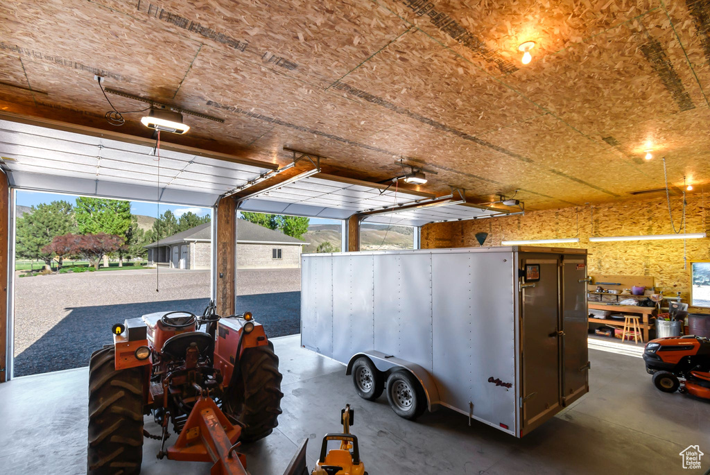 Garage featuring a garage door opener