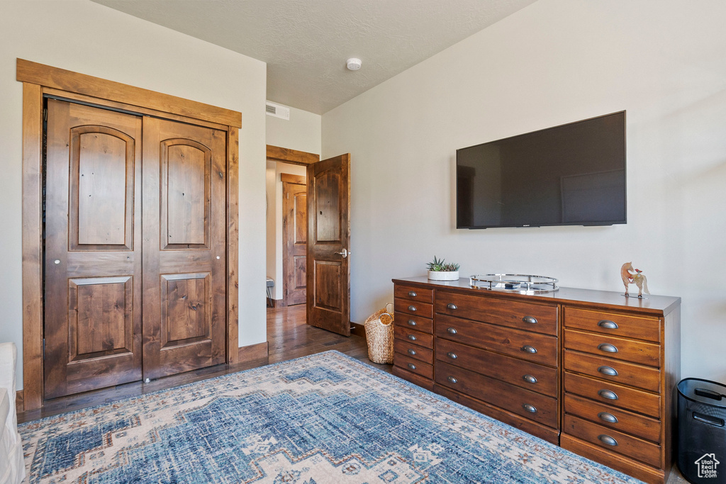 Bedroom featuring wood finished floors