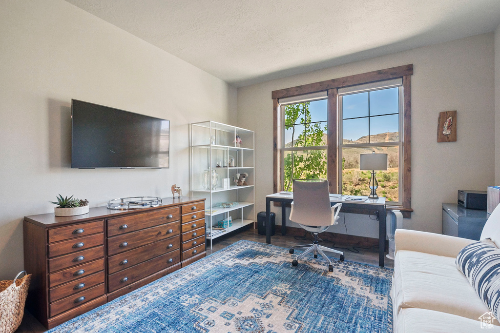 Home office featuring baseboards