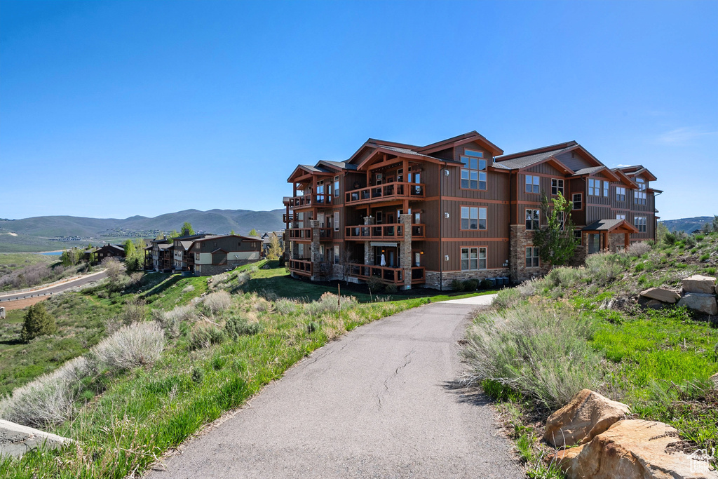 View of property with a mountain view