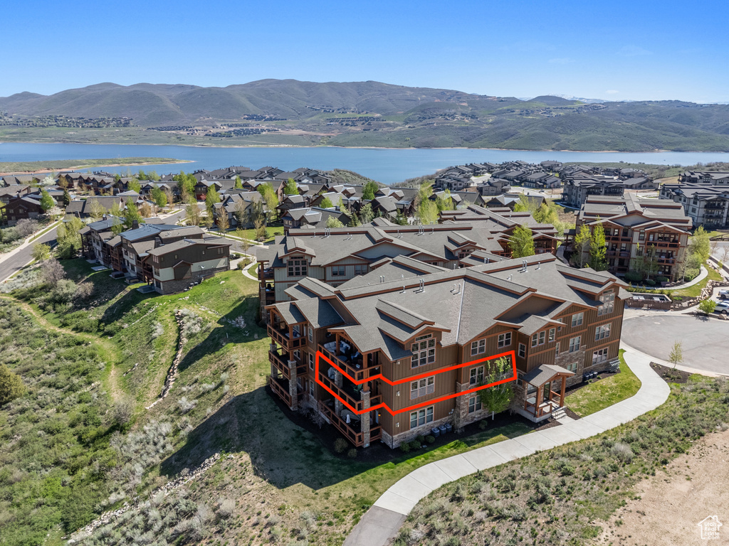 Aerial view of residential area with a water and mountain view