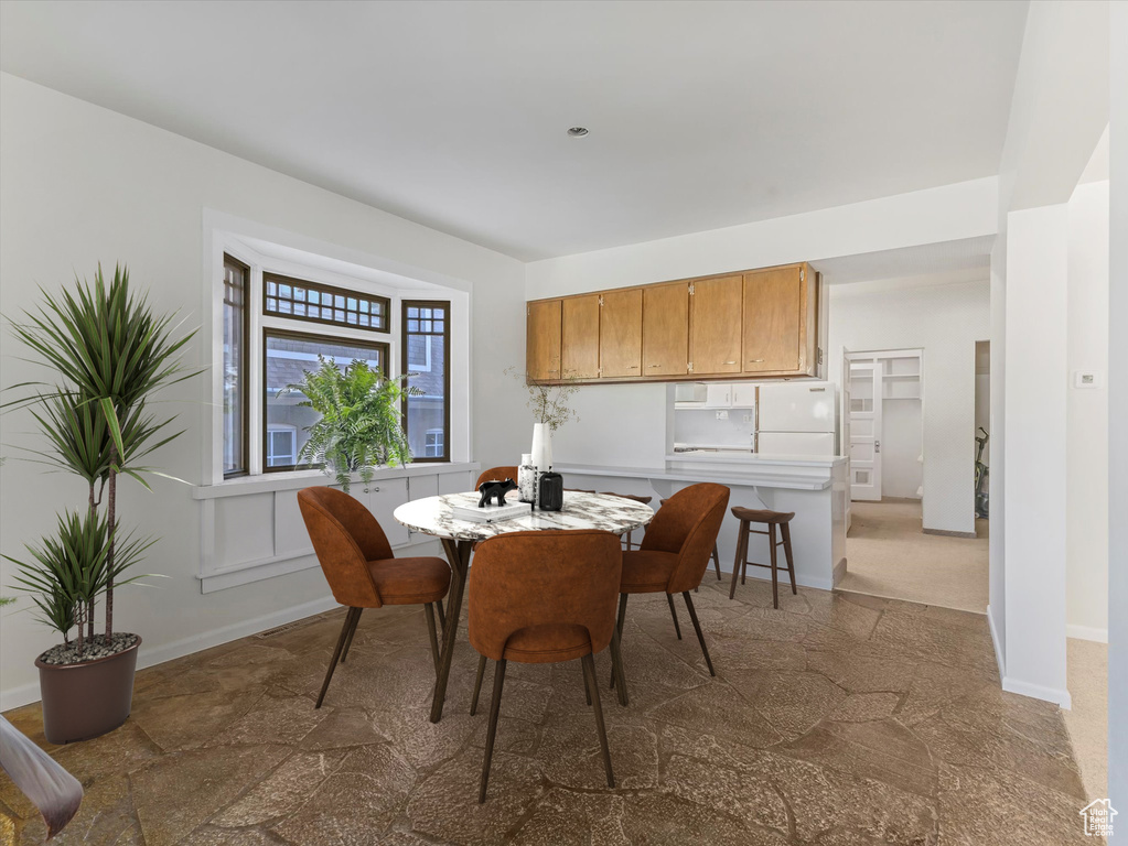 Dining area with baseboards