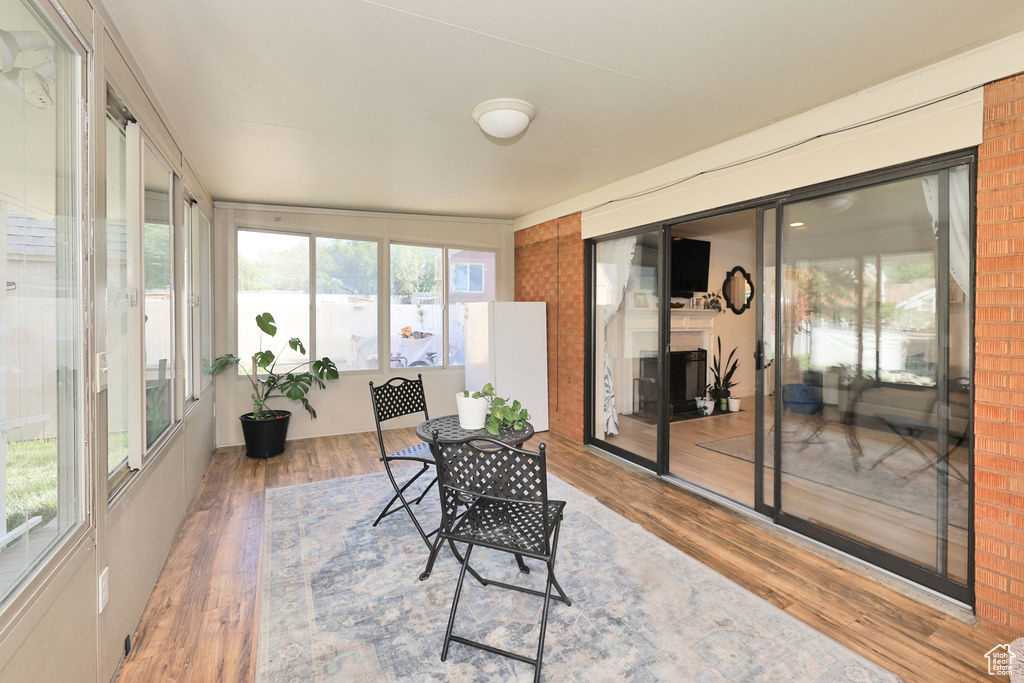 Sunroom / solarium with wood finished floors
