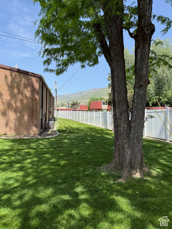 View of yard with a mountain view