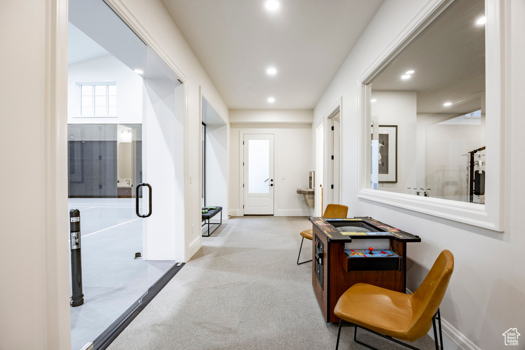 Corridor featuring carpet floors, recessed lighting, and baseboards