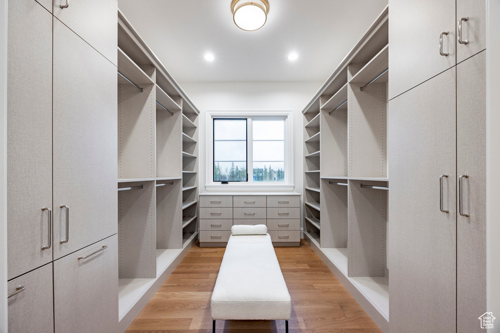 Walk in closet featuring light wood finished floors