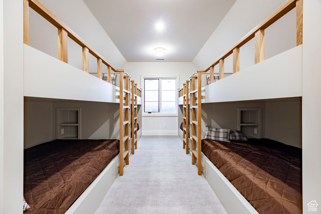 Bedroom featuring carpet floors, french doors, and baseboards