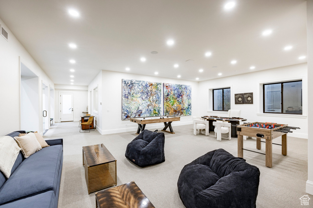 Game room featuring light carpet, baseboards, and recessed lighting