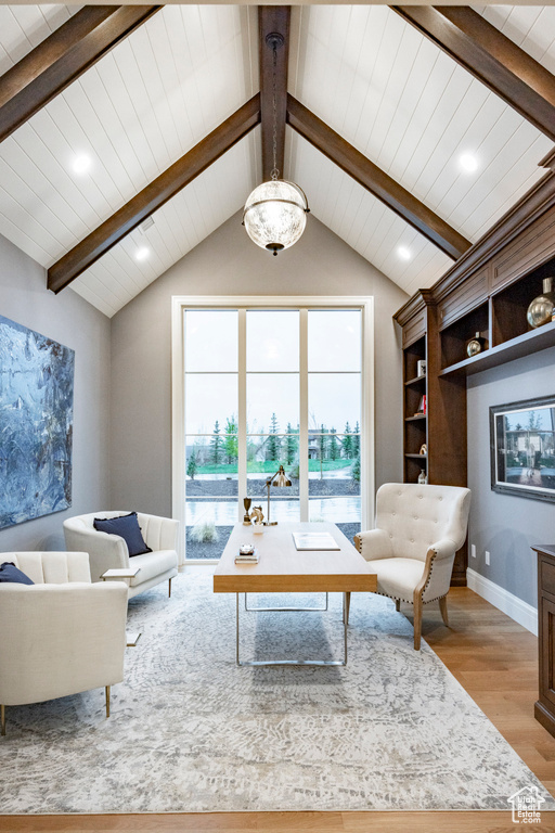 Living room with light wood-type flooring, wood ceiling, and recessed lighting