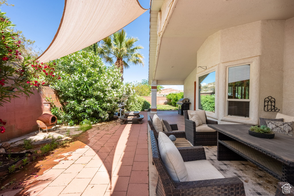 View of patio / terrace with a grill and an outdoor living space