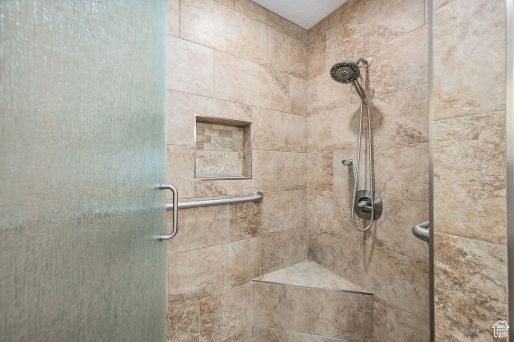 Full bath with a shower stall