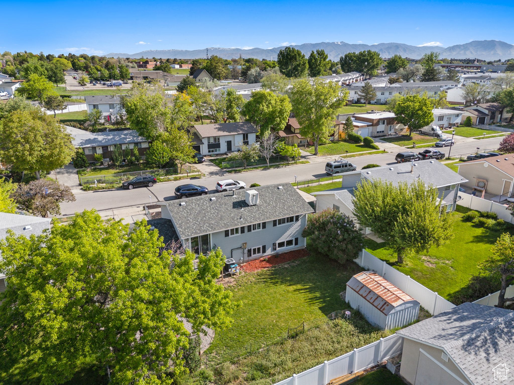 Aerial view of residential area with a mountain backdrop