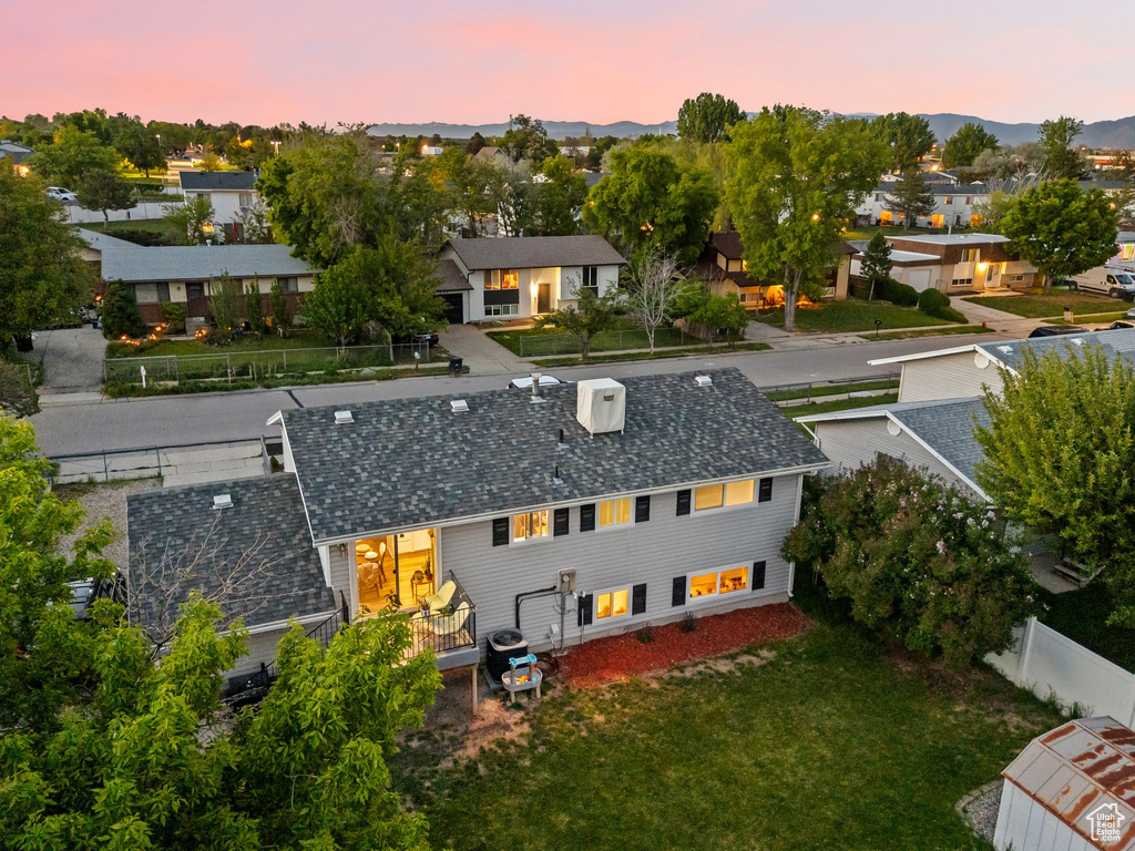 Aerial view of residential area with a mountainous background