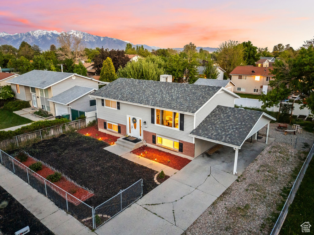 Aerial view at dusk of a mountain view and a residential view