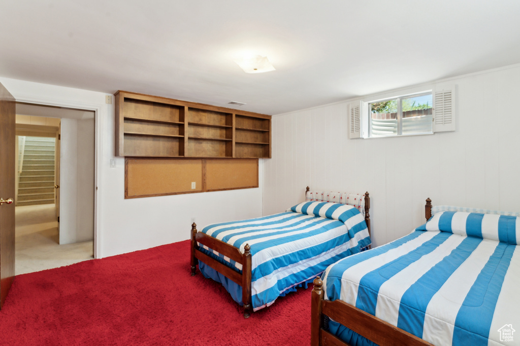 Bedroom featuring carpet floors
