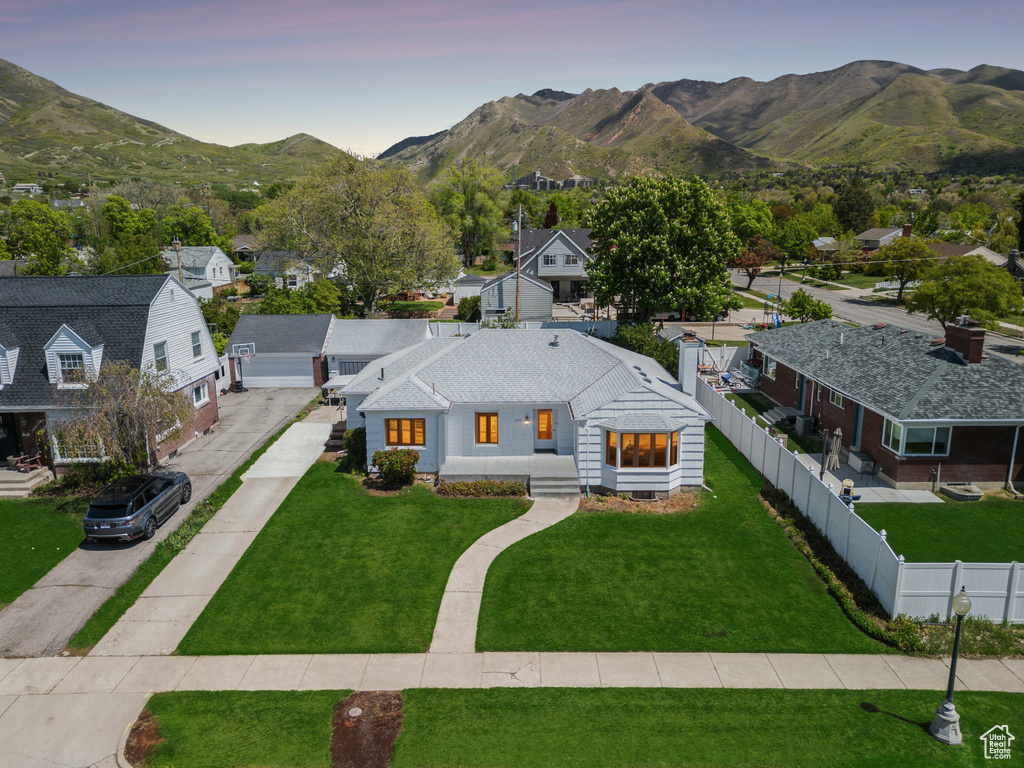 Aerial view at dusk of a mountain view and a residential view