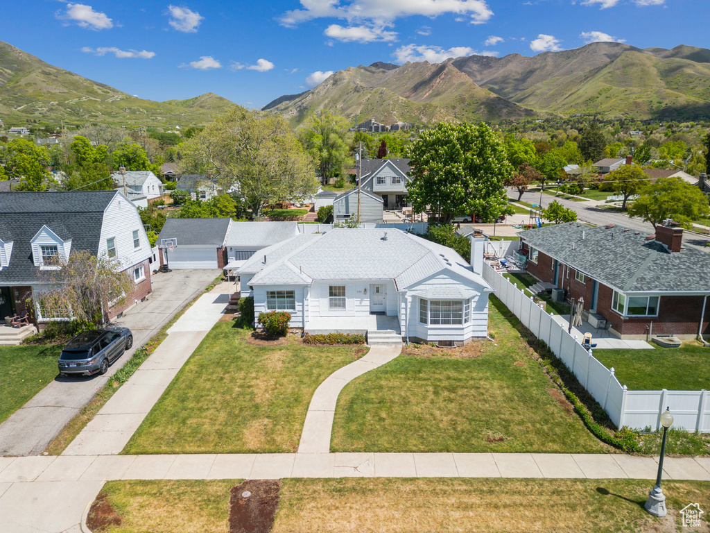 Aerial view of residential area with a mountain backdrop
