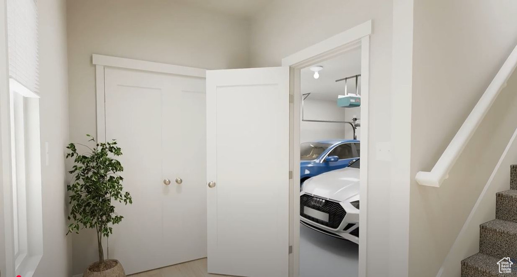 Laundry room with light wood-style floors