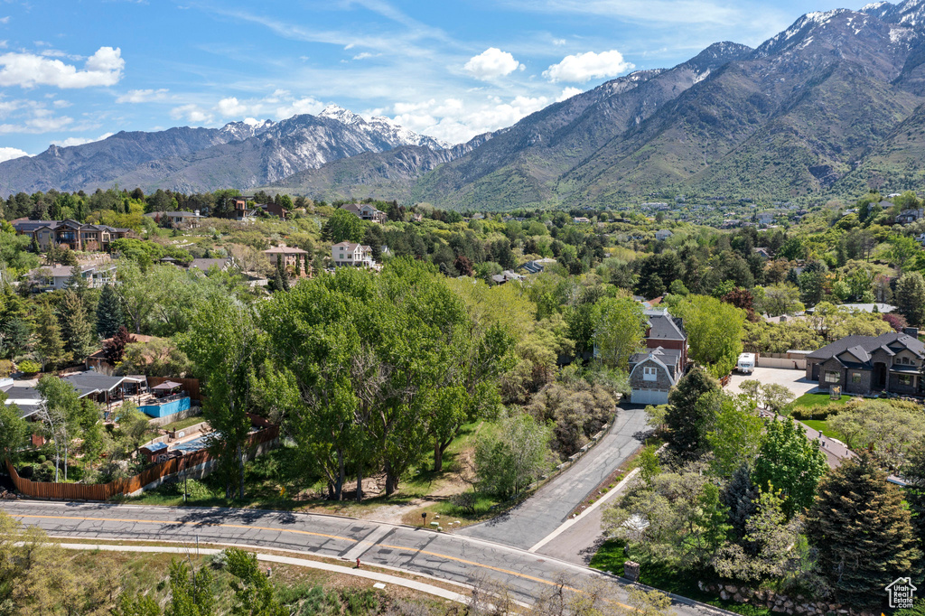 Aerial view of residential area with a mountainous background