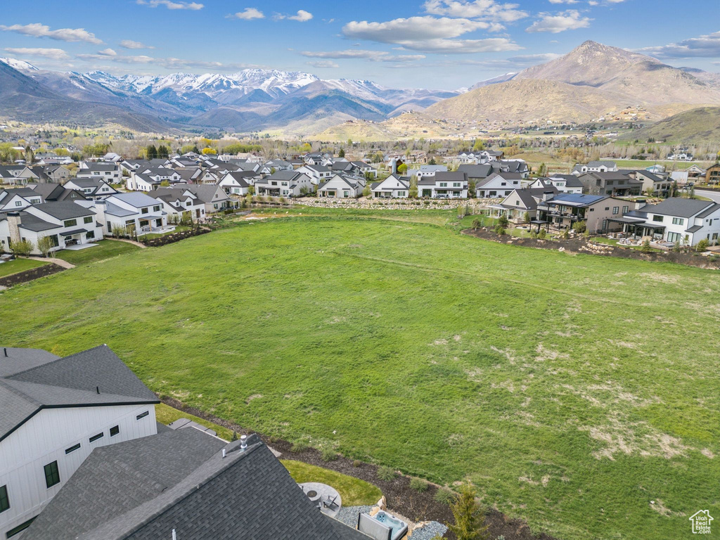 Aerial view of residential area with a mountainous background