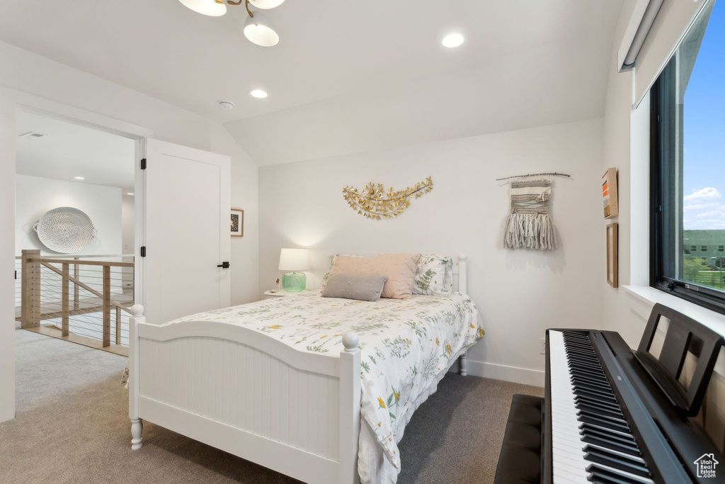 Carpeted bedroom featuring baseboards and recessed lighting