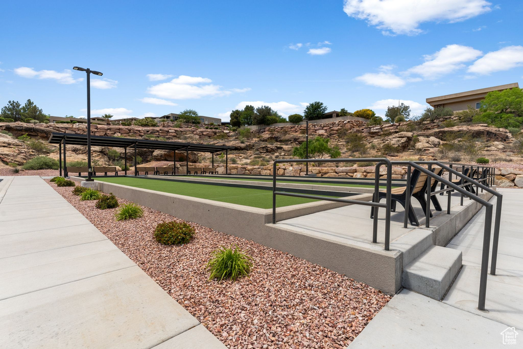 View of community with a bocce ball area