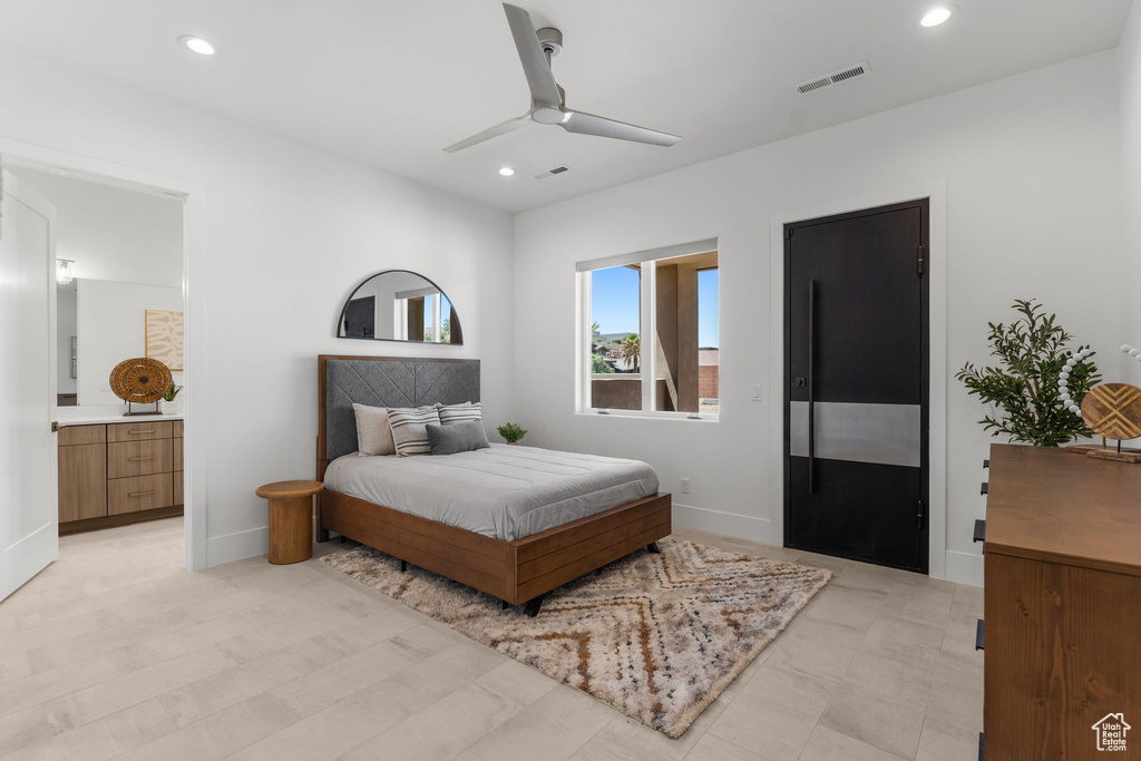 Bedroom with recessed lighting, ceiling fan, baseboards, and ensuite bath