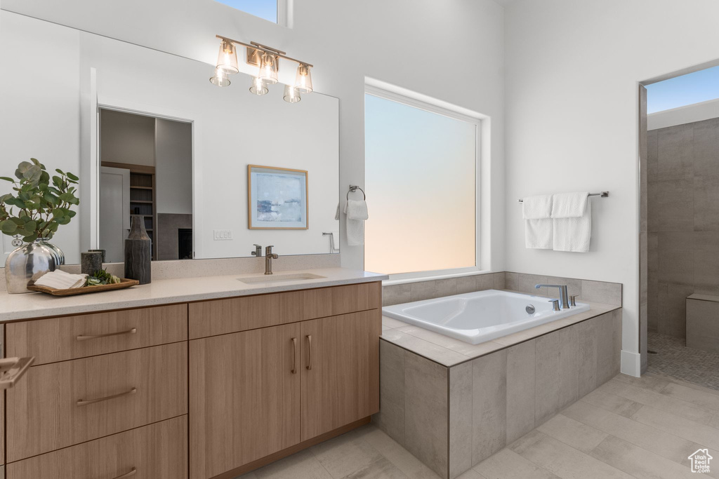 Bathroom with a garden tub and vanity