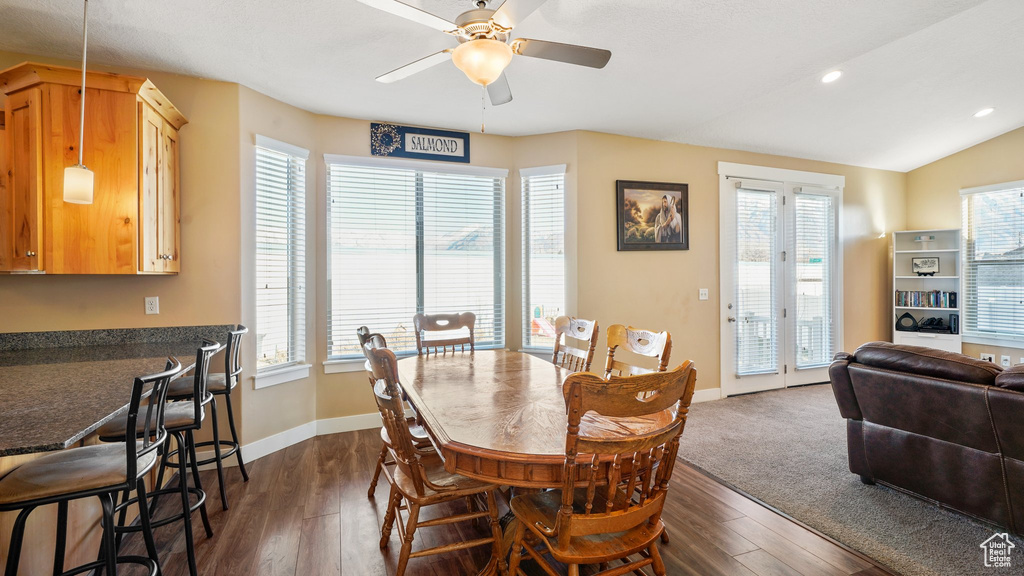 Dining room featuring a ceiling fan, dark wood-style floors, baseboards, and recessed lighting