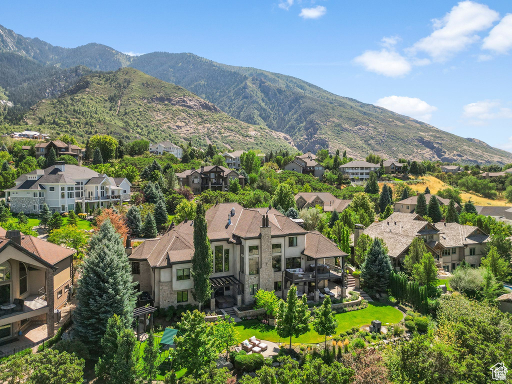 Exterior space with a residential view and a mountain view